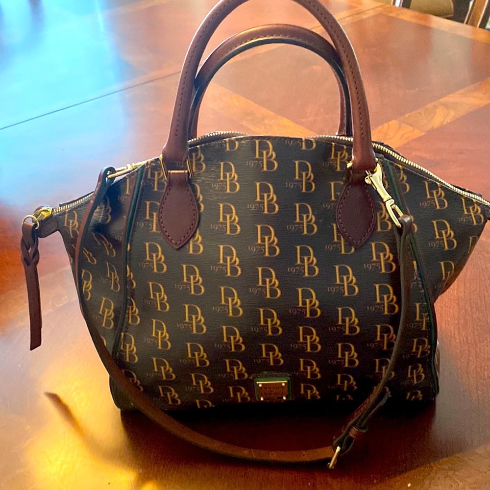 Dooney & Bourke - Color: Brown, Inside Red.